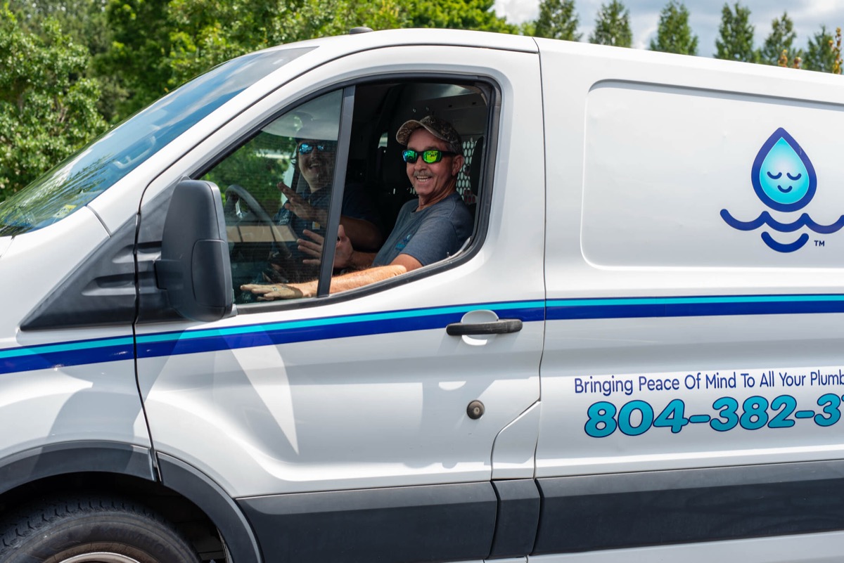 Chris Owens, owner and master plumber, in a Serenity Plumbing van