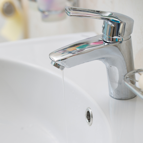 Faucet with sink in the bathroom