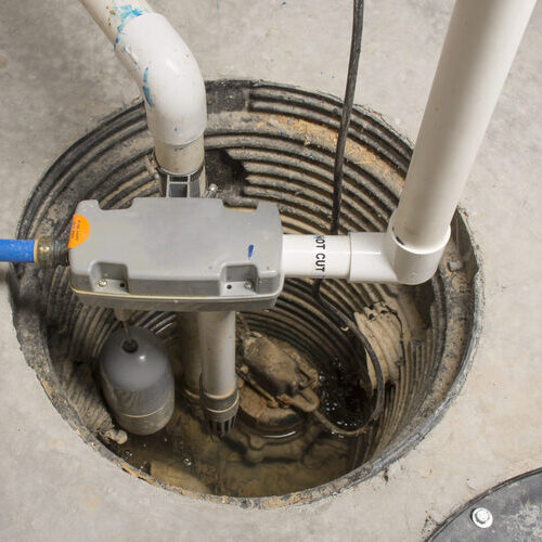 sump pump in a basement floor