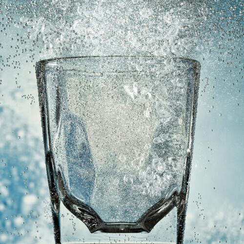 a glass with hard water